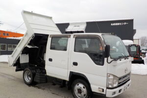 サムネイル: 平成23年　タイタン1.2tWキャブダンプ　★4WD★土砂禁★三方開★予備検付