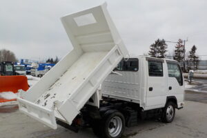 サムネイル: 平成23年　タイタン1.2tWキャブダンプ　★4WD★土砂禁★三方開★予備検付