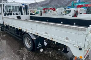 サムネイル: 【平成２１年】　三菱　ファイター　４トン　ハイジャッキセルフ　★ウインチ付　★ベッド付　(車検1年付）【お問い合わせは北見店へ～TEL0157-57-7166～】